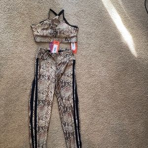 New Workout set Animal print . Size M. Brand: DiPaula